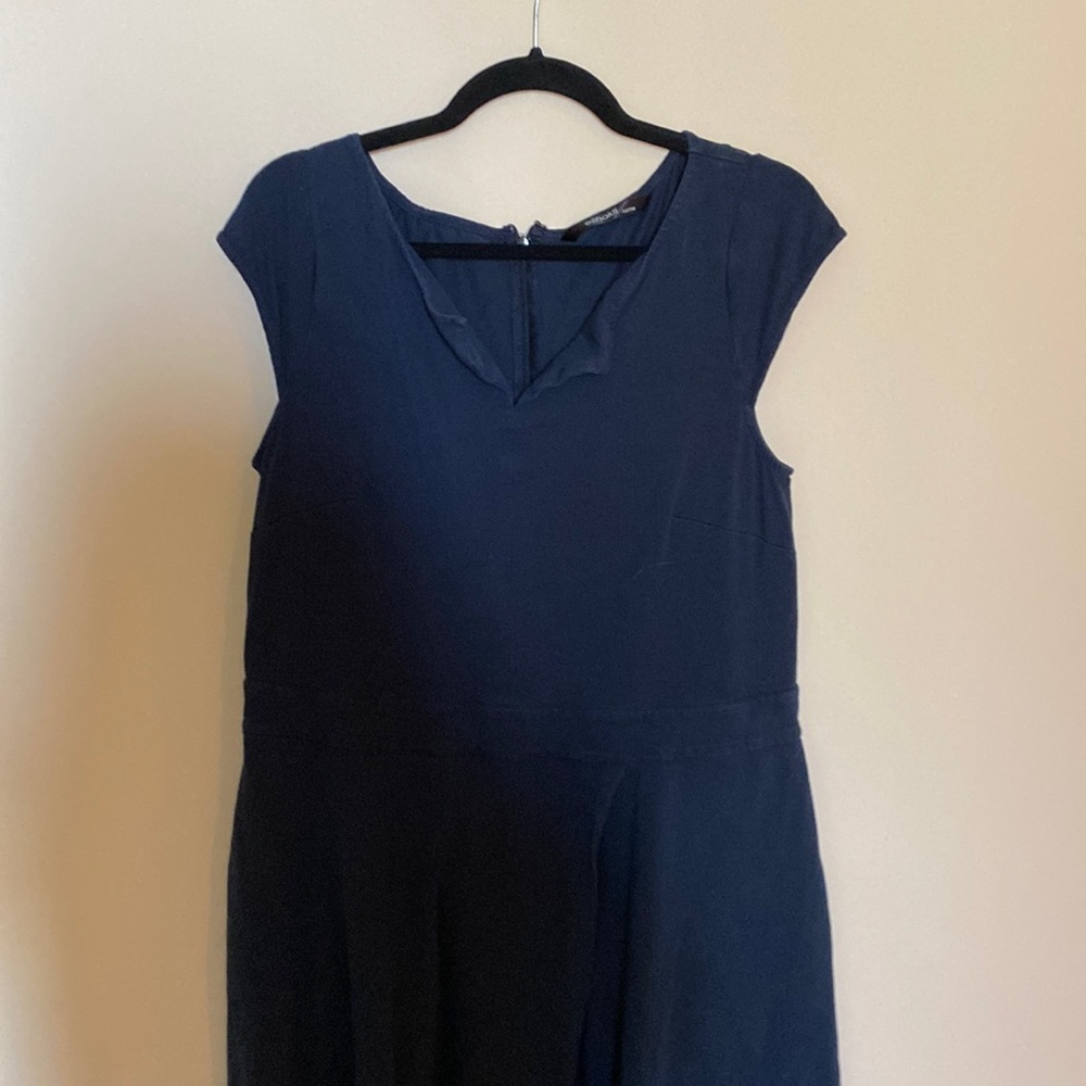 Blue sleeveless cotton jersey dress with asymmetrical wrap hem